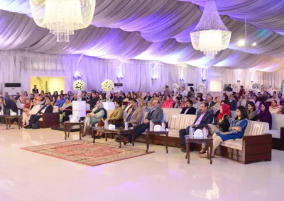 Members seated audience at Jacaranda Family Club evening event