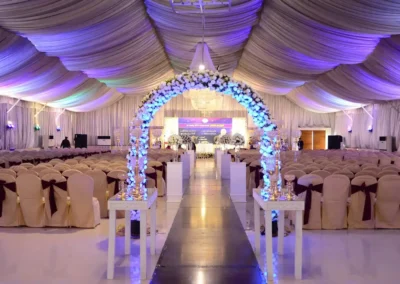 Floral entrance arch at An Evening With Anwar Masood, Jacaranda Family Club DHA