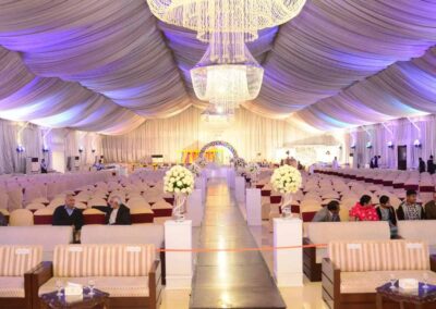 Elegant chandelier and drapery setup at Jacaranda Family Club event hall in DHA Islamabad